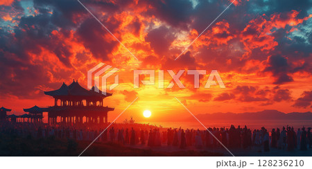 a vibrant sunrise over the Ysyakh festival grounds, with silhouettes of people celebrating 128236210