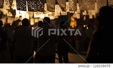 Night festival celebration with paper decorations and crowd illuminated by warm lights 128238079