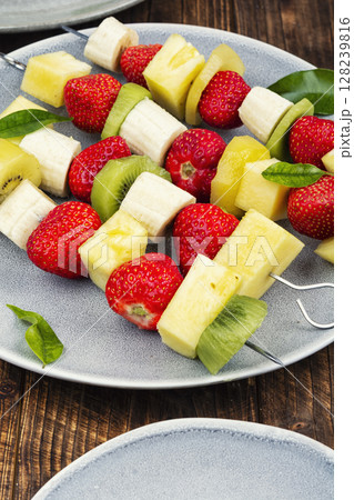 Colorful fruit skewers. Colorful fruit skewers. 128239816