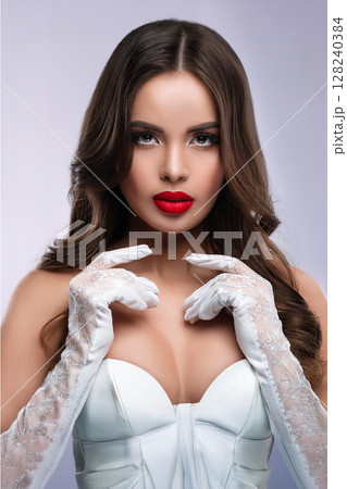 Elegant Woman in Corset and Gloves 128240384