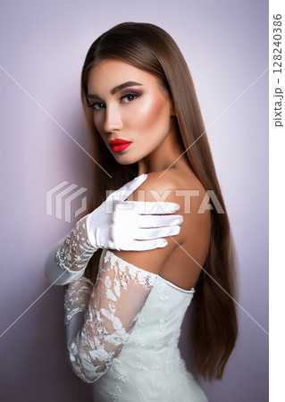 Elegant Woman in Corset and Gloves 128240386
