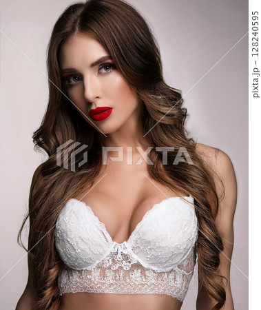 Elegant Woman in Lace Bralette and Gloves 128240595