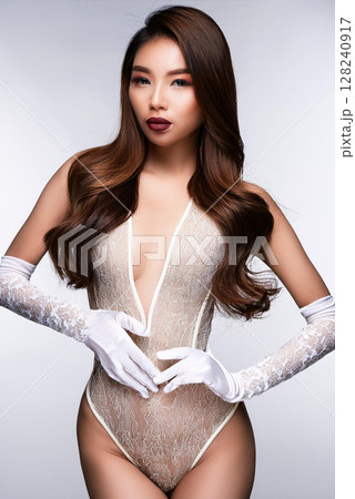 Gorgeous Woman in Elegant Lace Bodysuit 128240917