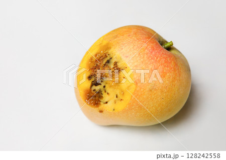 Ripe Mango Cut Open Revealing Unexpected Internal Rot and Mold Despite Fresh Outer Appearance 128242558