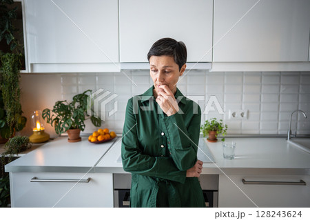 Worried depressed woman deep in thoughts, contemplation in melancholy and distress solitude at home 128243624