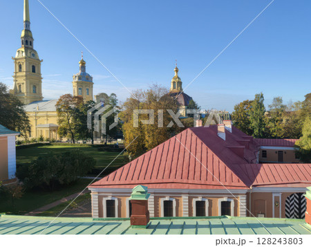 View of the roofs of St. Petersburg and the domes of churches. Horizontal photo, sunny autumn day. View of the roofs of St. Petersburg and the domes of churches. Horizontal photo, sunny autumn day. 128243803