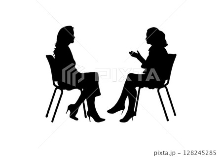 Two women in conversation, silhouette style, on a white background. Concept of communication 128245285