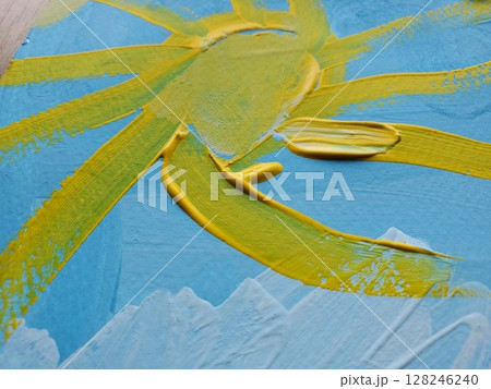 Naive art painting sun created by finger paint strokes. Hand drawing summer background Naive art painting sun created by finger paint strokes. Hand drawing summer background 128246240