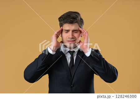 Mature Businessman With Headache,Studio Portrait.sick Boss Man Puts Hand On Head Mature Businessman With Headache,Studio Portrait.sick Boss Man Puts Hand On Head 128246300