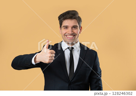 Businessman With Hand Sign Like,Thumbs Up Gesture. Happy Ceo Leader Man On Beige 128246302
