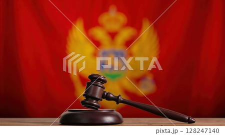 Montenegrin justice concept with wooden judge's gavel Montenegrin justice concept with wooden judge's gavel 128247140
