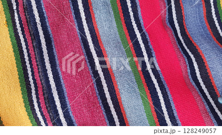 Texture of traditional Turkish ethnic striped carpet closeup 128249057
