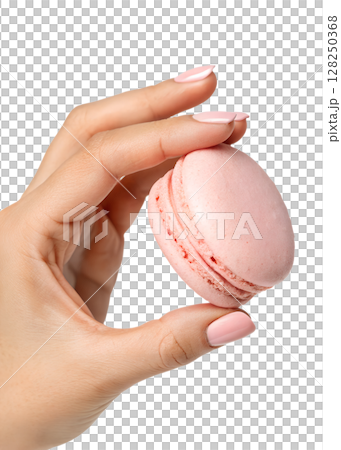 Hand holding delicate pink macaron, french pastry, isolated on transparent background, sweet dessert, gourmet treat, bakery item 128250368