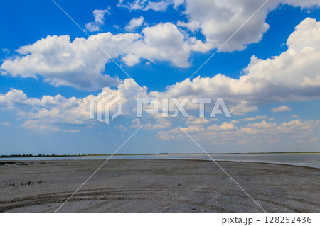 View of a salt Ustrichnnoe (oyster) lake in Kherson region, Ukraine View of a salt Ustrichnnoe (oyster) lake in Kherson region, Ukraine 128252436