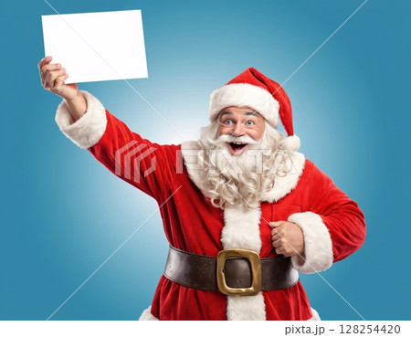Portrait of santa claus holding blank sign on blue background.  128254420