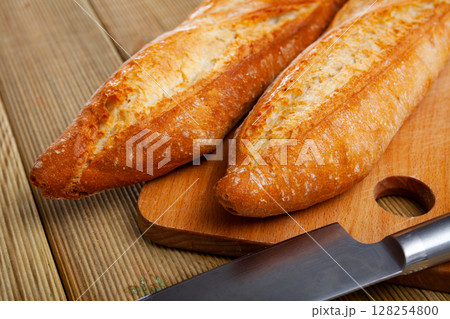 Image of crunchy homemade fresh baked baguettes 128254800