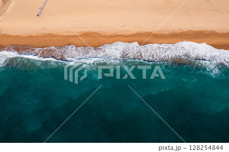 Drone view of the foamy sea waves Drone view of the foamy sea waves 128254844