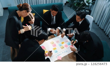 Top view of business people making kanban or scrum task board. Directorate. Top view of business people making kanban or scrum task board. Directorate. 128256473