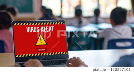 Virus warning alert on computer screen detected brisk cyber threat 128257101