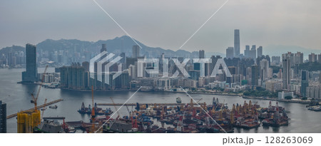 July 6 2025 Panoramic View of a Modern Cityscape and Harbor on a Cloudy Day 128263069