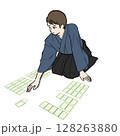 百人一首でかるたを取る袴を着た男性のイラスト素材 128263880