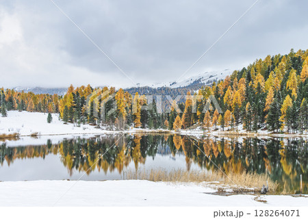 Autumn landscape with mountain hatred lags and first snowfalls Autumn landscape with mountain hatred lags and first snowfalls 128264071