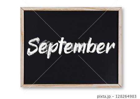 September word in chalk on chalkboard 128264983