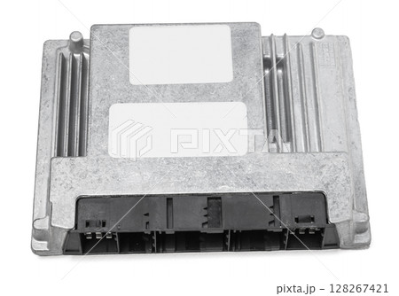 Metallic car engine control unit with plastic elements on a white isolated background is connecting center of various subsystems, units and assemblies. Monitoring the state of the moment. Spare part 128267421