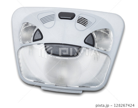 The removed spare part from the car on a white isolated background is the interior light in the ceiling for replacement and repair. Spare parts catalog 128267424