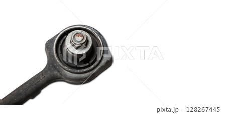 Close-up of a silent block on a used aluminum suspension with fasteners, spare parts for sale during junk yard or for replacement during car service Close-up of a silent block on a used aluminum suspension with fasteners, spare parts for sale during junk yard or for replacement during car service 128267445