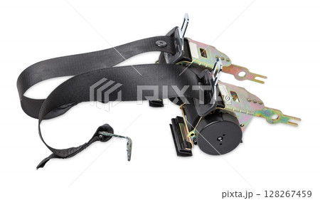 Spare part and interior element black seat belt from a car on a white isolated background. Auto service industry. Spare part and interior element black seat belt from a car on a white isolated background. Auto service industry. 128267459