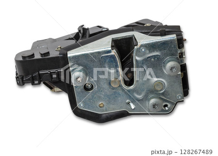 Detail of a car spare part made of black plastic and metal - door lock separately isolated on a white background. Repair in a car workshop, equipment for sale. Detail of a car spare part made of black plastic and metal - door lock separately isolated on a white background. Repair in a car workshop, equipment for sale. 128267489