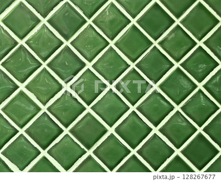 黄緑色の正方形のタイルが斜めに貼られた壁面の背景画像 128267677