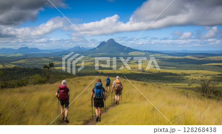 Young people hiking through scenic landscapes in nature 128268438