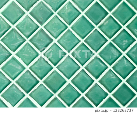 明るい緑色の正方形のタイルが斜めに貼られた壁面の背景画像 128268737
