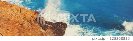 Rocky seashore. Stormy sea. Beautiful wild nature. Horizontal banner 128268836