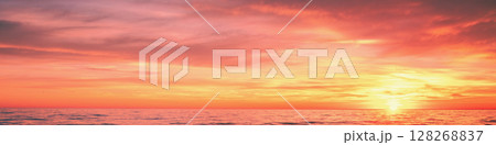 Seascape in the evening. Sunset over the sea. Dramatic sky. Horizontal banner 128268837