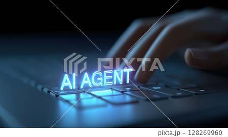 AI Agent assistance and workflow automation concept, A hand hovering over a laptop with glowing text "AI AGENT. 128269960