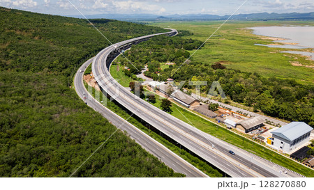 Drone shot The M6 motorway Nakhon Ratchasima Province - Bang Pa-in Lam Ta Khong River and Mountain. Motorway Korat Thailand 128270880