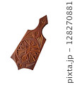 Wooden cutting board for kitchen with geometric patterns on white background 128270881