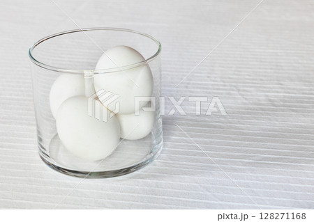 White eggs on white table White eggs on white table 128271168