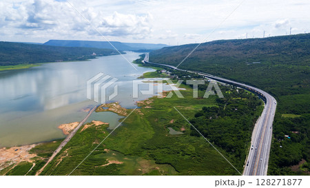 Drone shot The M6 motorway Nakhon Ratchasima Province - Bang Pa-in Lam Ta Khong River and Mountain. Motorway Korat Thailand 128271877
