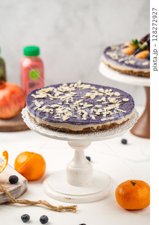Blueberry cake with almond flakes on stand Blueberry cake with almond flakes on stand 128272927