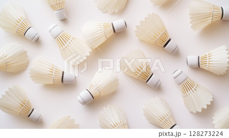 Feather badminton shuttlecocks on white surface 128273224