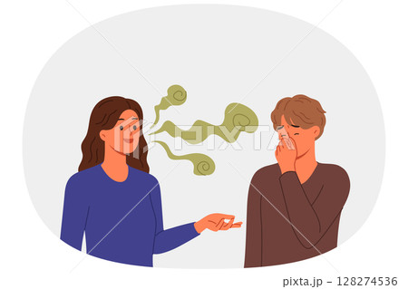 Stinky breath woman with bad teeth or caries irritates guy covering nose with hand 128274536