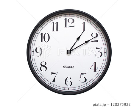 Round analog wall clock with a black frame, white face, and bold black numerals. showing 01:10 or 13:10. Isolated on a white background. Ideal for time-related themes. Round analog wall clock with a black frame, white face, and bold black numerals. showing 01:10 or 13:10. Isolated on a white background. Ideal for time-related themes. 128275922