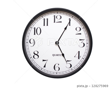 Round analog wall clock with a black frame, white face, and bold black numerals. showing  05:05 or 17:05. Isolated on a white background. Ideal for time-related themes. 128275969