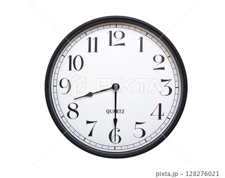 Round analog wall clock with a black frame, white face, and bold black numerals. showing  08:30 or 20:30. Isolated on a white background. Ideal for time-related themes. 128276021