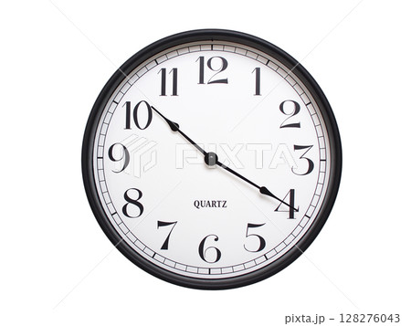 Round analog wall clock with a black frame, white face, and bold black numerals. showing  10:20 or 22:20. Isolated on a white background. Ideal for time-related themes. 128276043