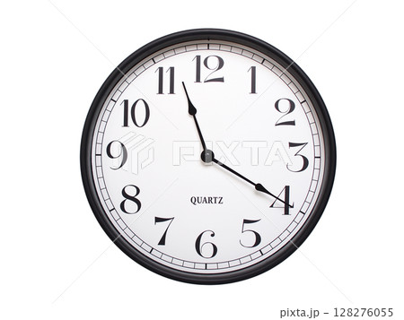 Round analog wall clock with a black frame, white face, and bold black numerals. showing  11:20 or 23:20. Isolated on a white background. Ideal for time-related themes. 128276055